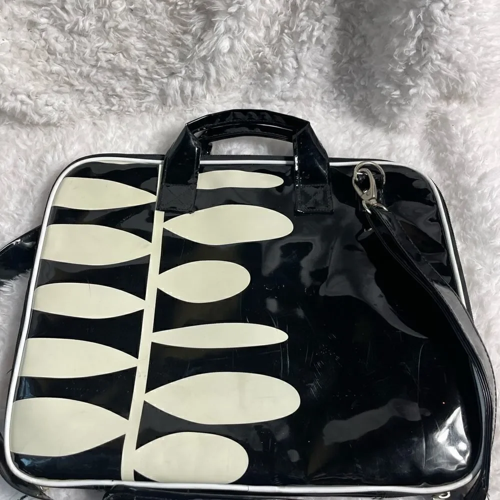 Black and white padded laptop bag with detachable padded shoulder strap